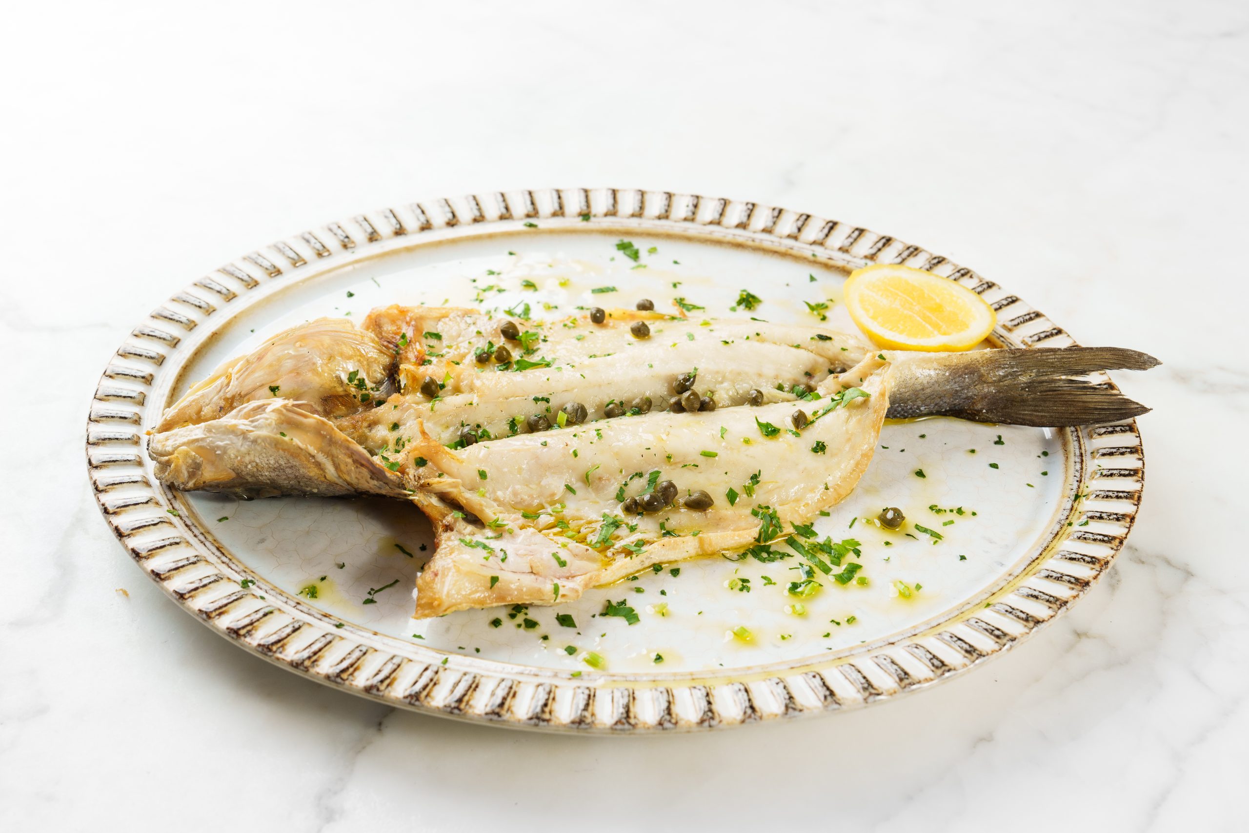 Branzino Al Limone e Capperi